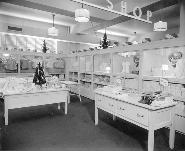 The baby department, stocking clothing, toys, and accessories, at Manchester's Department Store.