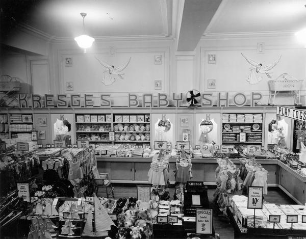Elevated interior view of the baby department at Kresge's store.