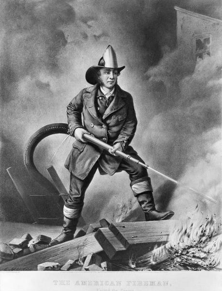 A fire fighter stands over a fire as he trains his hose on the flames.  This depicts the close proximity to the fire fire fighters were required to work before steam-powered pumpers became standard equipment.