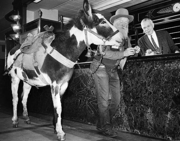 "The eyes of the guests popped, but room clerk Frank R. Witte, 1133 E Knapp Street, took it in stride Friday afternoon when Badwater Bill, accompanied by his pet burro, Nugget, registered in the Schroeder Hotel. It was Badwater Bill's way of telling Milwaukee he was in town to promote the state of Nevada at "The Milwaukee Sentinel" Sports and Boat Show which opens Saturday at 1 p.m. in the Arena and Auditorium."