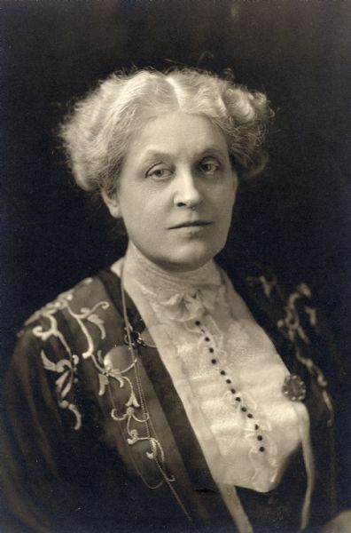 Waist-up studio portrait of suffragist Carrie Lane Chapman Catt.
