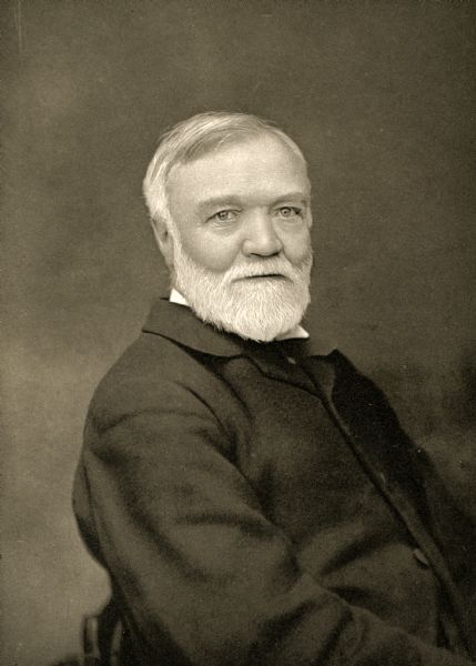 Waist-up studio portrait of Andrew Carnegie.