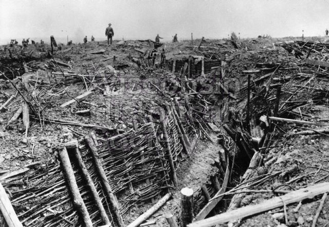 British troops clear German trenches that were destroyed in battle in the Messine Ridge, Flanders.