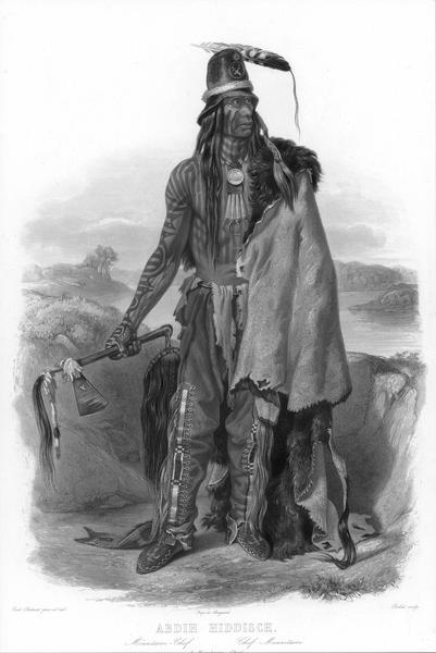 Abdih-Hiddisch, a Minatarre Chief, posed holding an ax.