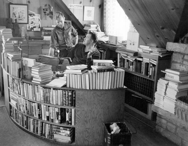 Office of author August Derleth, Wisconsin's Very Live Radio's (WVLR) unofficial consultant on the history of the Sauk-Prairie area. Derleth's novels and stories documented this community 40 miles northwest of Madison. Caption reads: "Author August Derleth serves as WVLR's unofficial consultant on history of Sauk-Prairie area."