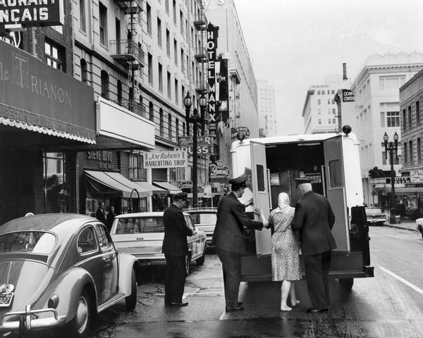 San Francisco police arrest a "suspicious woman" and help her into an International Metro Wagon #689 truck during their Golden Gate beat.