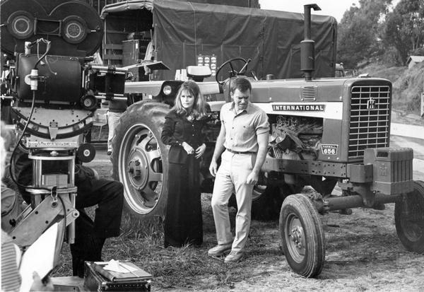 Actor Ken Berry and actress Marianna Hill with a Farmall 656 tractor on the set of the television show "Mayberry RFD". The tractor was a prop for the episode titled "Millie's Girlfriend" which aired on March 24, 1969.