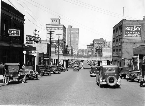 Downtown Aurora, a "prosperous town in good farming country," seen from the street.