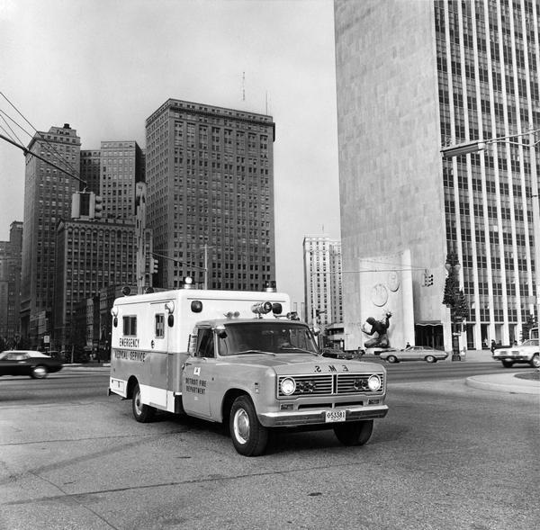 International Model 1310 ambulance at midday in the downtown area.