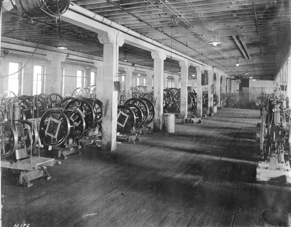 Stationary engines on skids inside International Harvester's Milwaukee Works. The factory was owned by the Milwaukee Harvester Company until 1902.