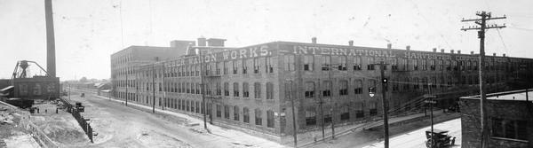 Elevated panoramic view of International Harvester's Weber Works factory building in Auburn Park. The factory was owned by the Weber Wagon Company until 1904, when it was purchased by International Harvester.