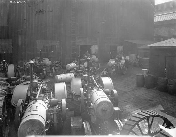 Newly assembled Titan 10-20 HP tractors waiting for painting at International Harvester's Milwaukee Works. The factory was owned by the Milwaukee Harvester Company before 1902.