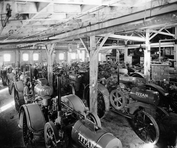 Titan 10-20 HP tractors in a warehouse at International Harvester's Milwaukee Works. The factory was owned by the Milwaukee Harvester Company before 1902.