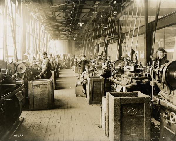 Workers machining parts with turret lathes at International Harvester's Milwaukee Works. The factory was owned by the Milwaukee Harvester Company before 1902.