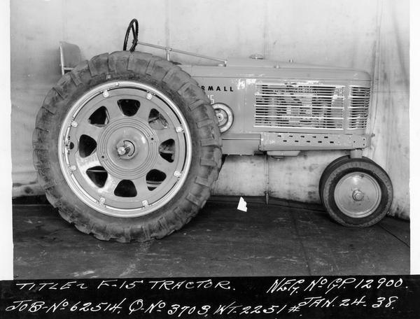 Engineering photograph of an experimental Farmall tractor designated as model "F-15". Right side view.