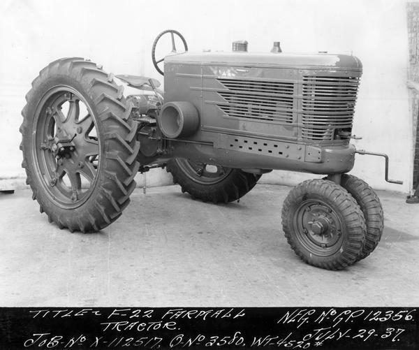 Engineering photograph of an experimental Farmall tractor designated as model "F-22". Three-quarter view towards front right.