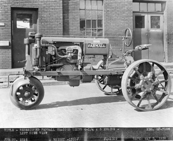Engineering photograph of an experimental, redesigned Farmall tractor with 4 1/4" x 5" engine. Left side view.
