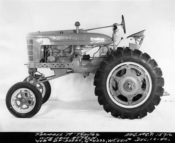 Engineering left side view of a McCormick-Deering Farmall M high clearance (high crop) tractor with cane attachment.