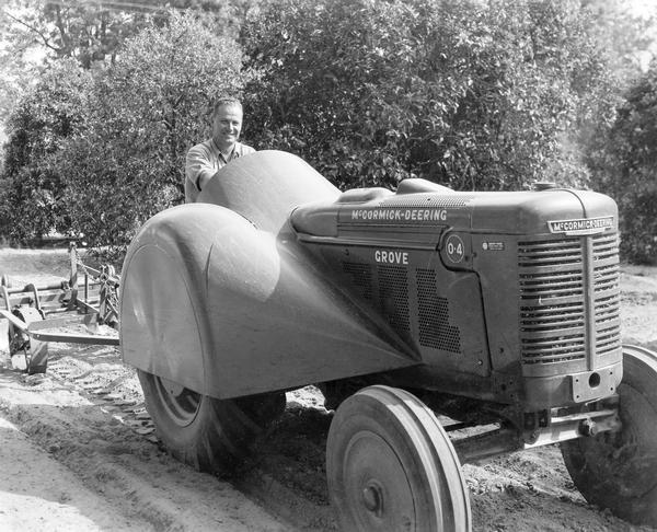 H.S. Teig with his new McCormick-Deering O-4 grove tractor and harrow. Mr. Teig was born and raised in Norway and emigrated to California.