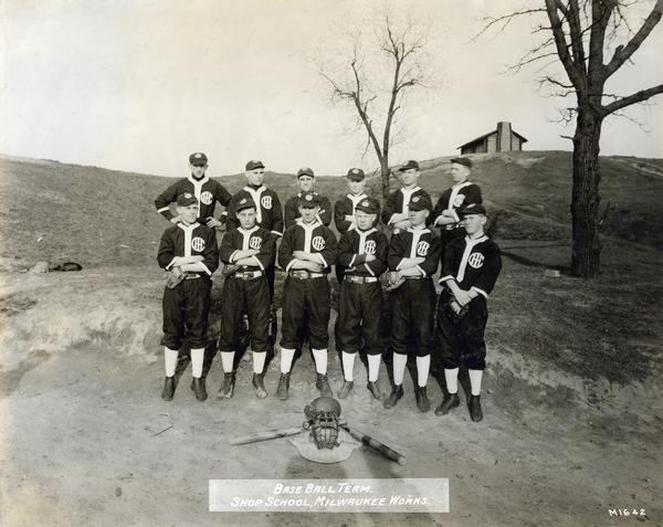 Group portrait of International Harvester's Milwaukee Works shop school baseball team.