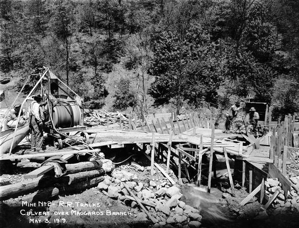 Workers building a culvert over Maggard's Branch near mine no. 2. Benham was a "company town" created by International Harvester for the workers employed in the mines of its subsidiary, the Wisconsin Steel Company.