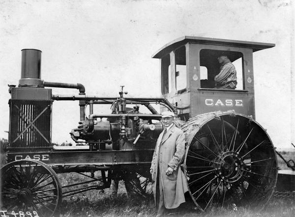 Men pose with a J.I. Case 20-40 tractor at the Winnipeg tractor contest in Canada.