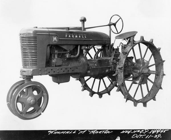 Engineering three-quarter view towards left front of an experimental Farmall M tractor.