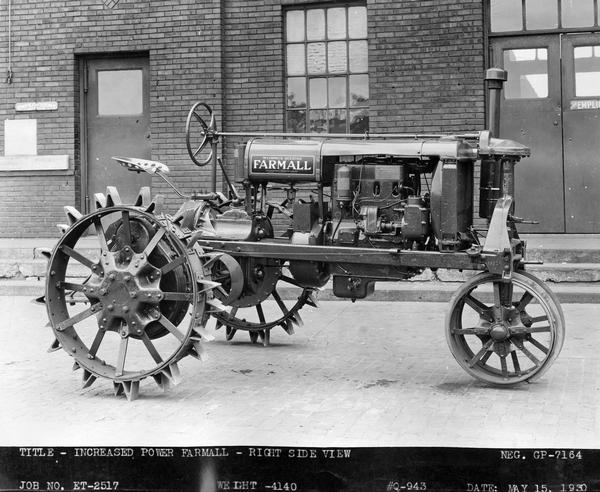 Engineering photograph of an experimental Farmall tractor with "increased power." Right side view.