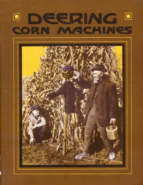 Cover of an advertising catalog for International Harvester's Deering line of corn machines, showing an old man next to a scarecrow with a jack-o-lantern for a head. The man is holding a jug and a young boy is crouched at the base of a pile of cornstalks.