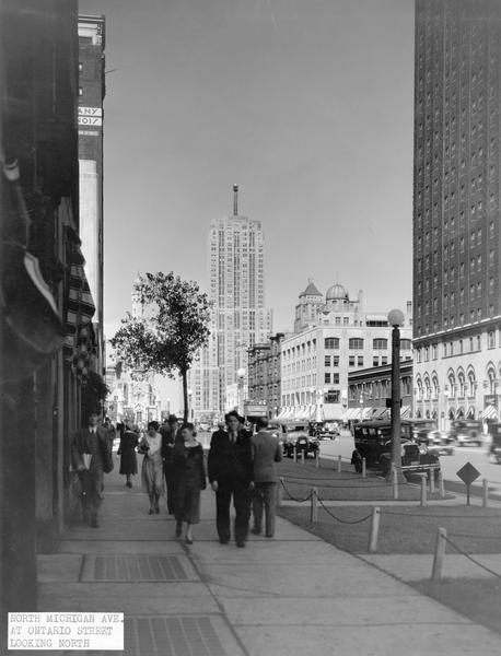 Street scene in Chicago of North Michigan Avenue and Ontario Street looking north. The historic Water Tower is in the background.