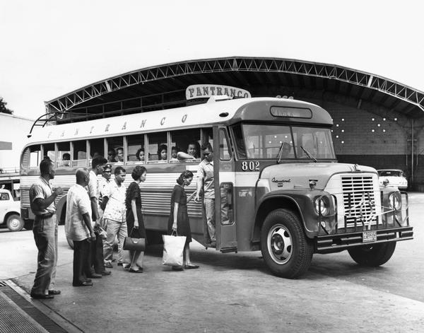 Commuters boarding an International Loadstar 1700 bus owned by the Pangasinan Transportation Company (PANTRANCO), Quezon City terminal, Philippines.