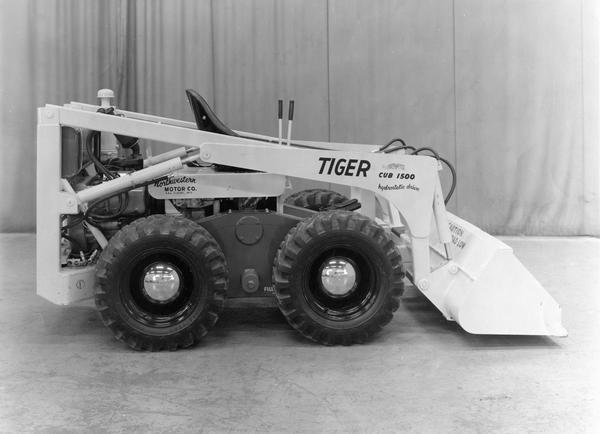 Engineering photograph of a Fairmount Tiger Cub 1500 loader with hydrostatic drive. The machine was manufactured by the Northwestern Motor Company of Eau Claire, Wisconsin. The photo was submitted to International Harvester's Patent Department.