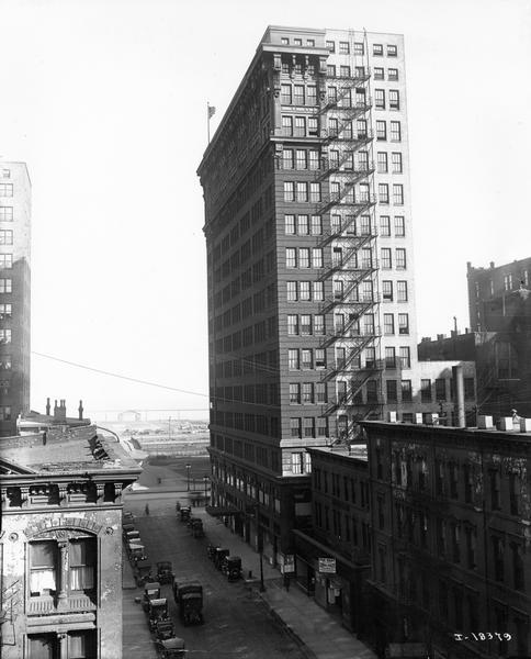 Elevated view of the International Harvester building, as seen from the northwest. Lake Michigan is in the background.