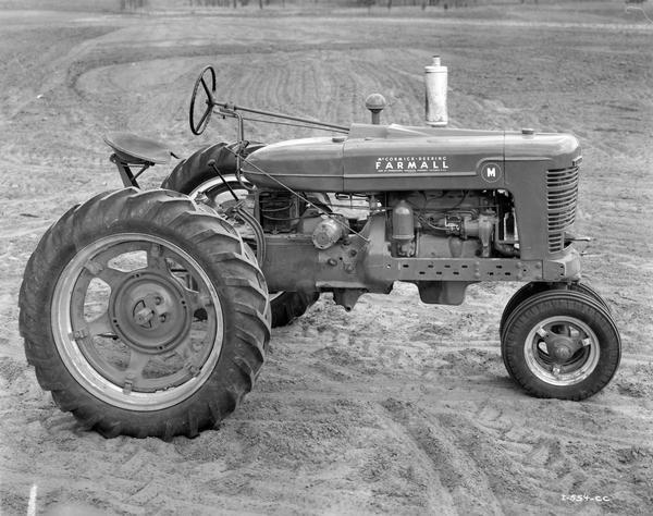 Engineering photograph of right side of an experimental McCormick-Deering Farmall M tractor.