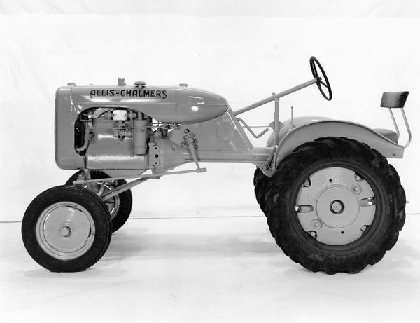 Studio photograph of an Allis-Chalmers model B tractor.