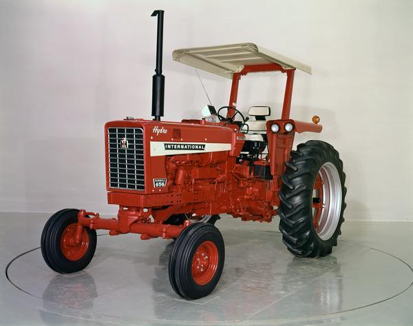 Color photograph of an International Farmall 656 Hydro tractor in a studio.