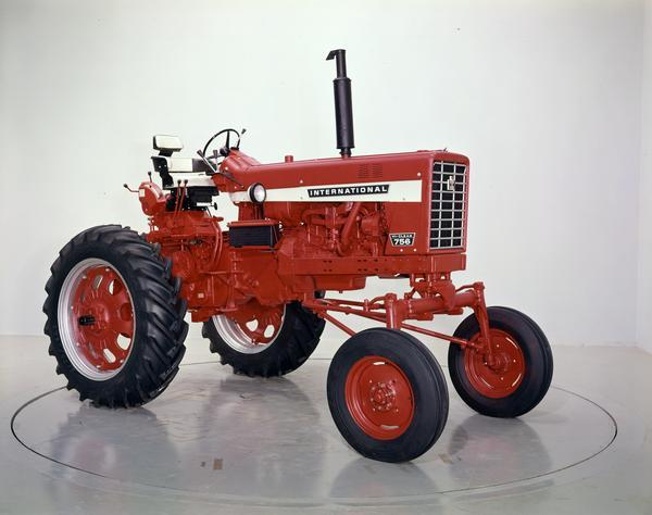 Color photograph of an International 756 Hi-Clear tractor in a studio.