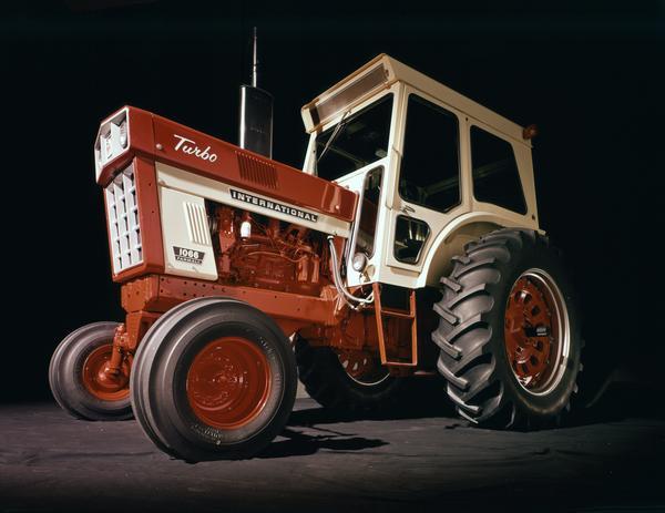 Color photograph of an International Farmall 1066 Turbo tractor in a studio.