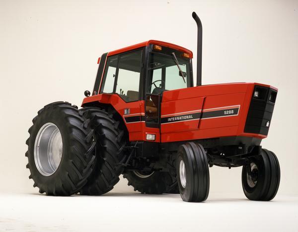 Color photograph of an International 5288 tractor with dual rear tires in a studio.