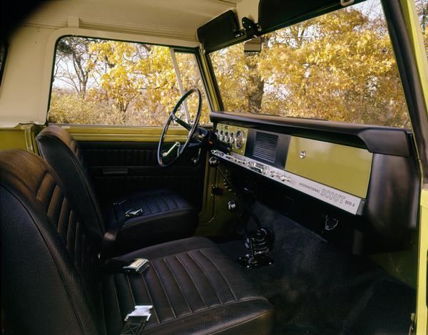 Color advertising photograph of the interior of a 1969 International Scout 800A truck.