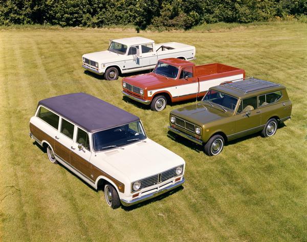Color advertising photograph of International Scout II, Scout pickup, Travelall, and Travelette trucks.