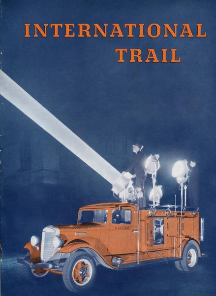 Cover of <i>International Trail</i> magazine featuring an International C-40 truck owned by the Memphis fire department and equipped with floodlights. Lieutenant B.C. Peterson designed and supervised construction which provides 2,017,500 watts to illuminate fires.