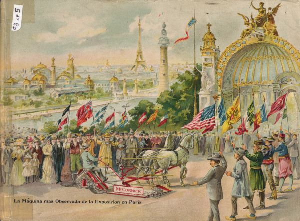 Cover of a Spanish-language catalog for McCormick brand harvesting machinery. The color illustration shows a McCormick binder on display at the Paris Exposition of 1900. A man is riding on the binder as it is pulled by two horses along a parade route lined with people holding flags from different countries. The Eiffel Tower is one of the buildings in the background. The text reads: "La Maquina mas Observada de la Exposicion en Paris."