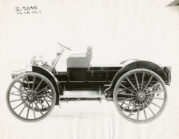 Driver's side view of an International Auto Wagon against a white background.