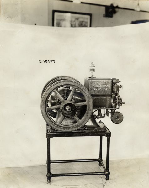 International Type M power unit photographed with a white sheet as a backdrop.