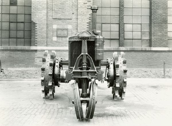 International Harvester engineering department photograph of an experimental Farmall tractor. The original caption reads: "15-30 Farmall tractor (redesigned) - front view."