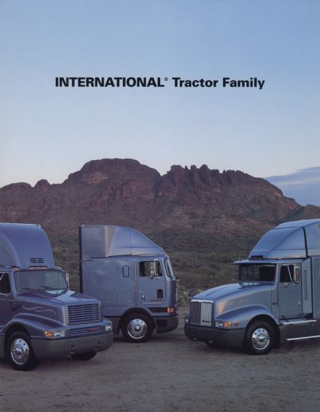 Front cover of a brochure advertising International semi tractors. Features a color photograph showing three different models in front of a desert landscape.
