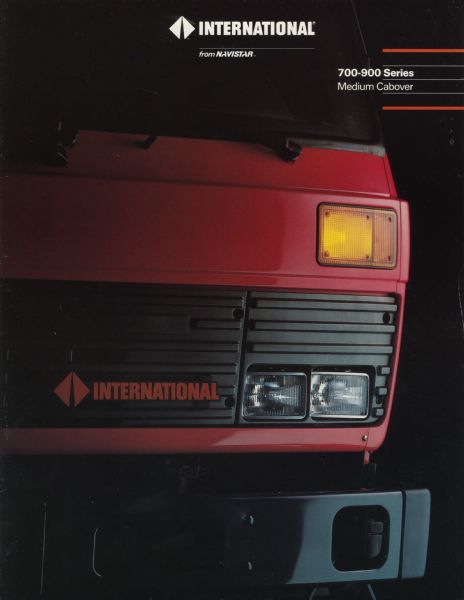 Front cover of a brochure advertising International 700-900 Series Medium Cabover trucks. Features a color photograph of a truck's front grille.