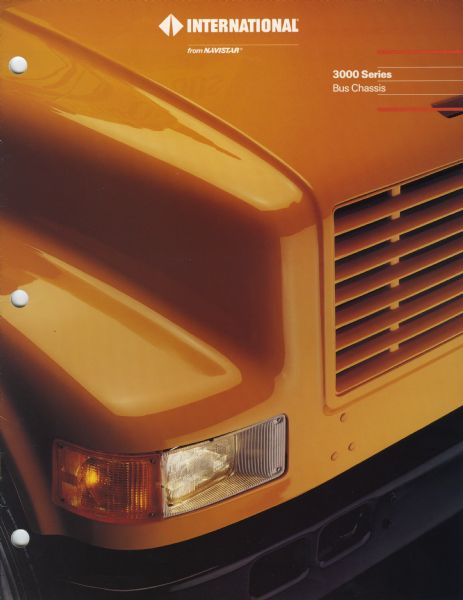 Front cover of a brochure advertising International 3000 Series bus chassis. Features a close-up of a school bus front grille.