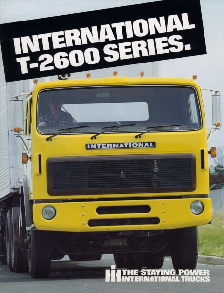 Front cover of a brochure for International T-2600 series trucks featuring a color photograph. The T-2600 was a heavy-duty truck manufactured in Australia by International Harvester Australia Limited.
